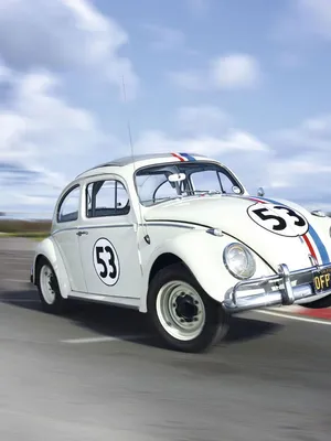 Herbie Fully Loaded Speeding On Racetrack Wallpaper