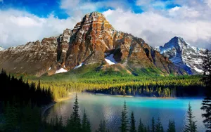 Hidden Lake Among The Foggy Mountains Wallpaper