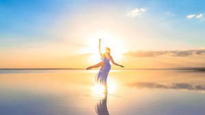 High Energy Lake Ballet Dancer Wallpaper