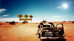 High Resolution Broken Car Desert Wallpaper