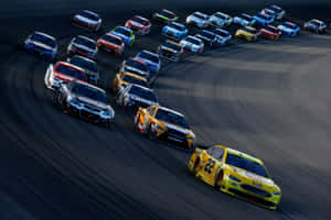 High-speed Nascar Racing Action Wallpaper