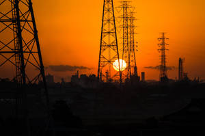 High Voltage Current Power Lines At Sunset Wallpaper