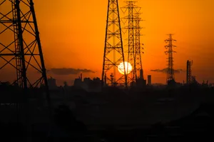 High Voltage Current Power Lines At Sunset Wallpaper