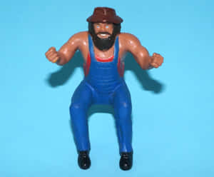 Hillbilly Jim Wrestling Figure Blue Background Wallpaper