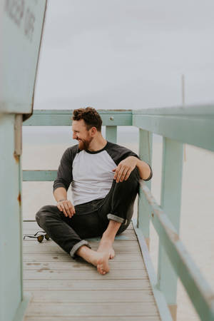 Hipster On A Green Dock Wallpaper