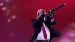 Hitman Agent 47 Aiming At A Target Wallpaper