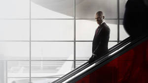 Hitman Full 4k Airport Escalator Wallpaper