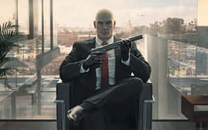 Hitman Sitting Down Desktop Wallpaper