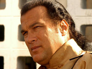 Hollywood Icon, Steven Seagal In Promotional Still Wallpaper