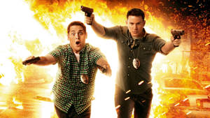 Hollywood Stars Channing Tatum And Jonah Hill In A Light-hearted Moment. Wallpaper