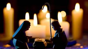 Holy Family And Candles Wallpaper