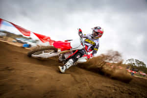 Honda Dirt Bike Red Swerving Left Wallpaper