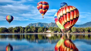 Hot Air Balloons Over Lake Reflection Wallpaper