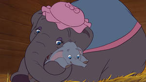 Hugging Baby Dumbo Wallpaper