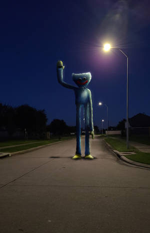 Huggy Wuggy Standing On Street Wallpaper