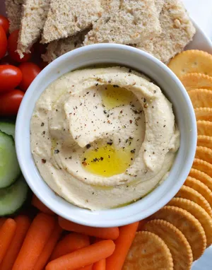 Hummus With Crackers And Vegetables Wallpaper