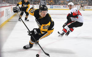 Ice Hockey Player Jake Guentzel Wallpaper