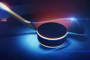 Ice Hockey Stick And Puck Wallpaper