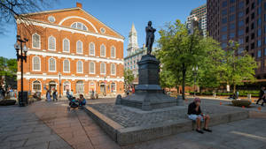 Iconic American Landmark - Faneuil Hall With A Monument In Foreground In Boston Wallpaper