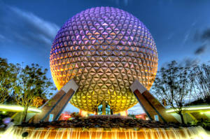 Iconic Spaceship Earth At Disney Theme Park Wallpaper