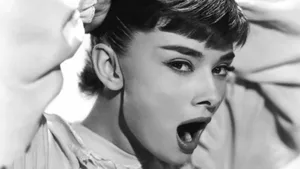 Iconic Star Yawning - Katharine Hepburn Wallpaper