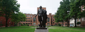 Iconic Statue Within The Campus Grounds Of George Washington University Wallpaper