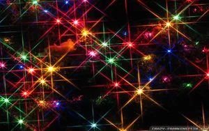 Illuminate The Holiday Season With Colorful Christmas Lights Wallpaper