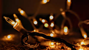 Illuminate Your Holiday Season With A Christmas Lights Aesthetic. Wallpaper