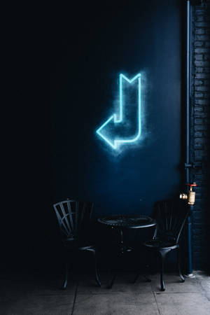 Illuminate Your Space With Blue Neon Light Wallpaper