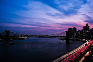 Illuminated City Streets Of New York Wallpaper