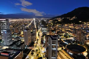 Illuminated Roads Of Bogota At Night Wallpaper
