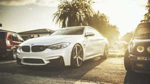 Image A Classically Designed Bmw Automobile Parked In A Contemporary Urban Setting. Wallpaper