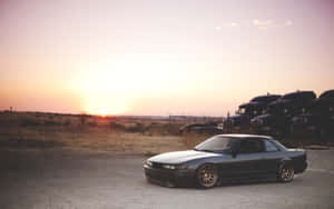 Image A Nissan Silvia S13 Sitting In A Car Park Wallpaper