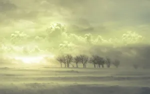 Image A Picture-perfect View Of White Snowy Clouds On The Horizon Wallpaper