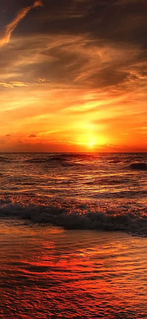 Image “enjoy The Sunset At The Beach With Your Iphone” Wallpaper