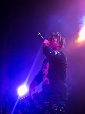 Image Juice Wrld Performing On Stage Wallpaper