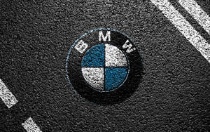 Image Sporty Black Bmw Drives Down A City Street Wallpaper