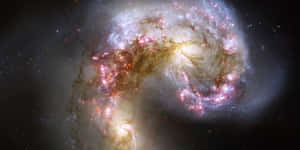 Image Striking View Of Galaxies Captured By The Hubble Space Telescope Wallpaper