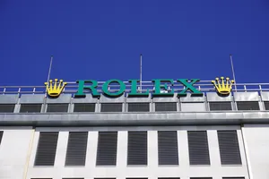 Impressive Rolex Logo On Building Facade Wallpaper