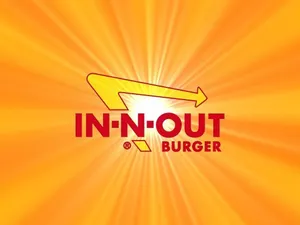 In-out Burger Logo With A Sunburst Wallpaper