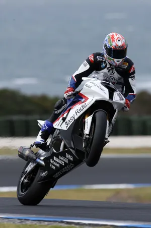 Incredible Racer In White Motorcycle Wallpaper