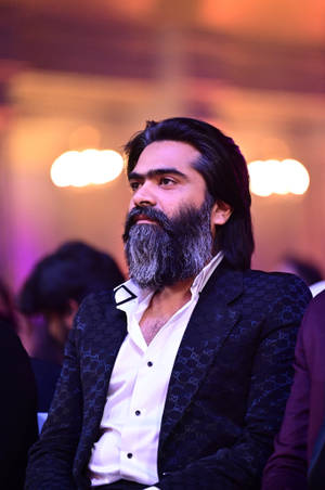 Indian Actor Simbu Displaying His Mature Charm In Gray Beard Wallpaper