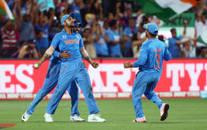 Indian Cricket Team In Action Wallpaper