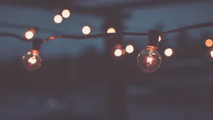Indie Aesthetic Laptop Light Bulbs At Night Wallpaper