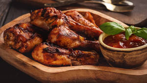 Indulge In The Aromas Of Tempting Tandoori Chicken Legs Wallpaper