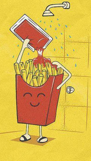 Indulgence In Taste - Golden French Fries Dipping In Catsup Wallpaper