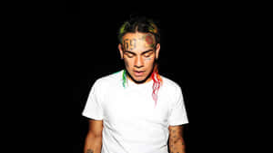 Influential Rapper 6ix9ine In Vibrant Portrait Wallpaper