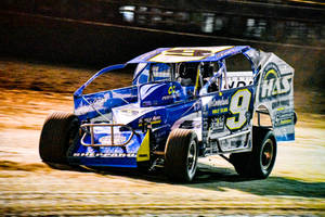 Intense Action On The Dirt Track Wallpaper