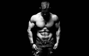 Intense Fitness Dedication - Black And White Portrait Of A Muscular Man Wallpaper