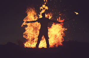 Intense Flames Dancing In The Night Wallpaper